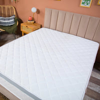 Ribbed upholstered bed